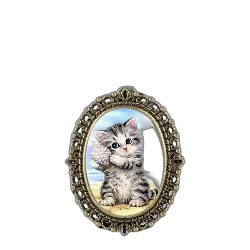 Portrait of a kitten in a kitty kitten pendant with bronze necklace watch