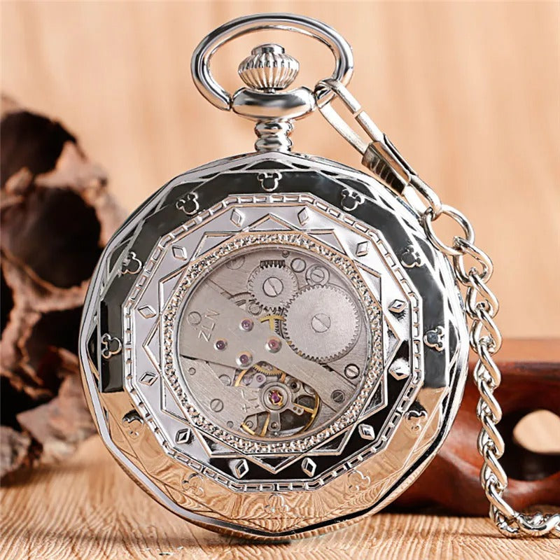 Montre à Gousset Mécanique Open Face Vintage coloris argent, dos du boîtier ajouré laissant voir le mouvement